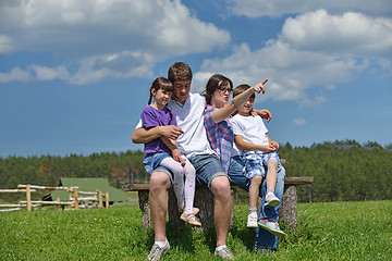 Image showing happy young family have fun outdoors