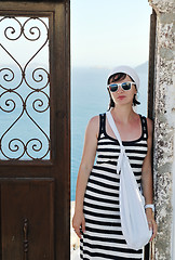 Image showing Greek woman on the streets of Oia, Santorini, Greece