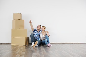 Image showing Young couple moving in new house