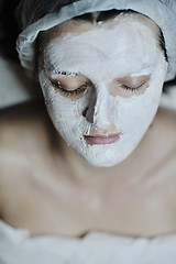 Image showing woman with facial mask in cosmetic studio