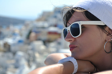 Image showing Greek woman on the streets of Oia, Santorini, Greece