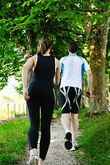 Image showing Young couple jogging