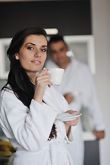 Image showing Young love couple taking fresh morning cup of coffee