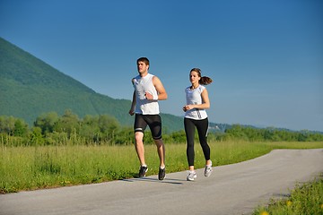 Image showing couple jogging