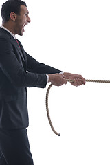 Image showing business man with rope isolated on white background