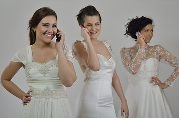 Image showing portrait of a three beautiful woman in wedding dress