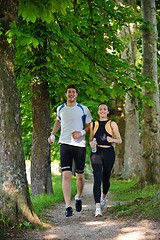 Image showing Young couple jogging