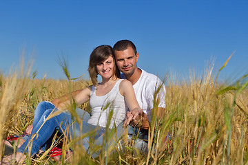 Image showing happy couple in wheat field