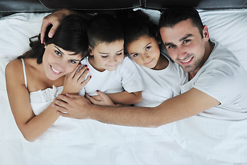 Image showing happy young Family in their bedroom
