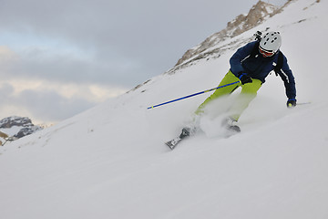 Image showing skiing on fresh snow at winter season at beautiful sunny day