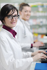 Image showing team of pharmacist chemist woman  in pharmacy drugstore