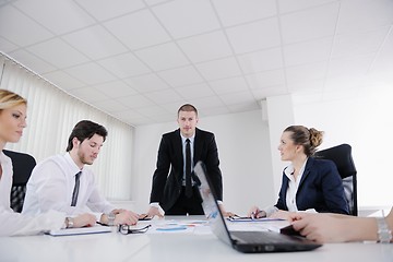 Image showing business people in a meeting at office