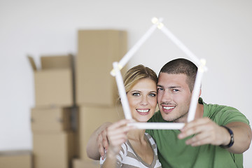 Image showing Young couple moving in new home