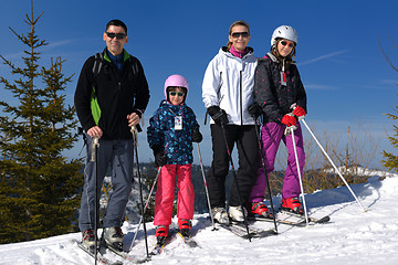 Image showing portrait of happy young family at winter