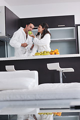 Image showing young couple have fun in modern kitchen