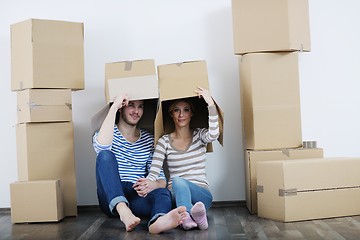 Image showing Young couple moving in new house