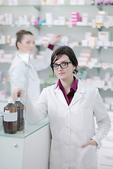 Image showing team of pharmacist chemist woman  in pharmacy drugstore