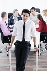 Image showing young business man at meeting