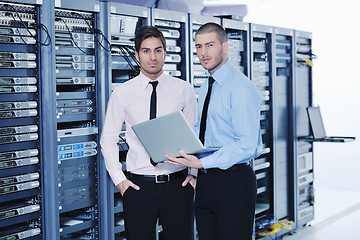 Image showing it enineers in network server room