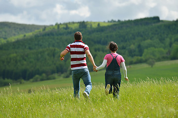 Image showing romantic young couple in love together outdoor