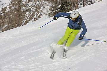 Image showing skiing on fresh snow at winter season at beautiful sunny day