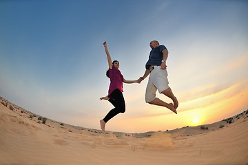 Image showing couple enjoying the sunset