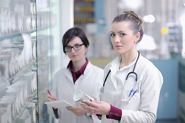 Image showing team of pharmacist chemist woman  in pharmacy drugstore