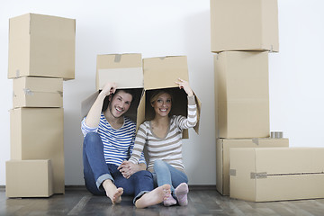 Image showing Young couple moving in new home