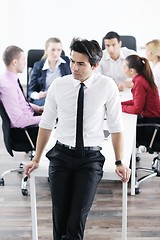 Image showing young business man at meeting