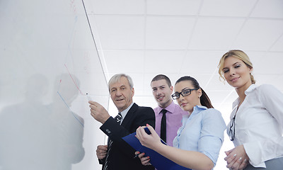 Image showing Senior business man giving a presentation