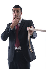 Image showing business man with rope isolated on white background