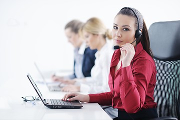 Image showing business woman group with headphones