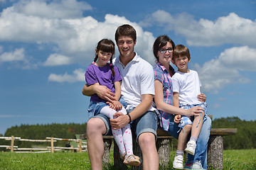 Image showing happy young family have fun outdoors