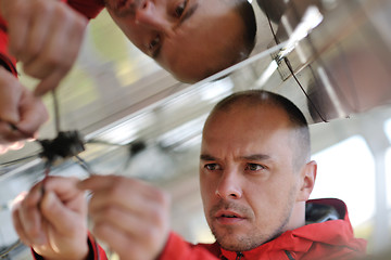 Image showing Male solar panel engineer at work place