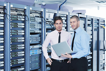Image showing it enineers in network server room