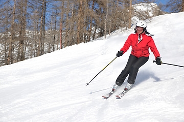 Image showing skiing on fresh snow at winter season at beautiful sunny day