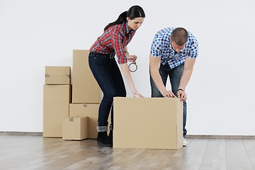 Image showing Young couple moving in new house