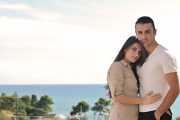 Image showing couple relaxing on balcony