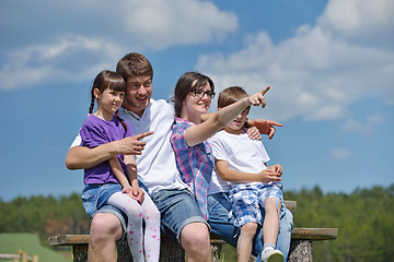 Image showing happy young family have fun outdoors