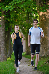 Image showing Young couple jogging