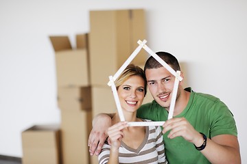 Image showing Young couple moving in new house