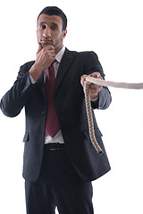 Image showing business man with rope isolated on white background