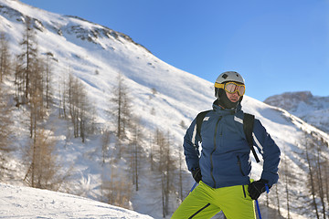 Image showing skiing on fresh snow at winter season at beautiful sunny day