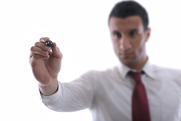 Image showing business man draw with marker on empty space