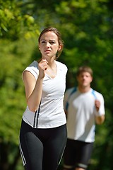 Image showing Young couple jogging at morning