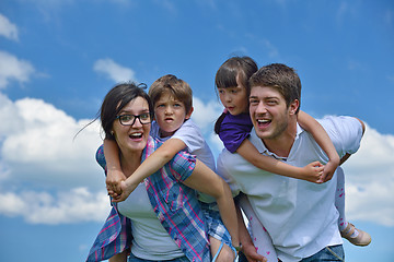 Image showing happy young family have fun outdoors