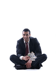 Image showing Business man holding money