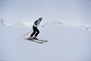 Image showing skiing on fresh snow at winter season at beautiful sunny day