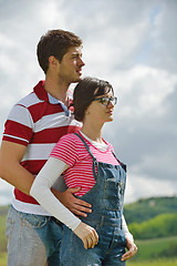 Image showing Portrait of romantic young couple smiling together outdoor