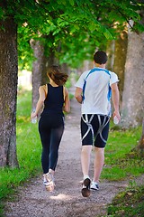 Image showing Young couple jogging